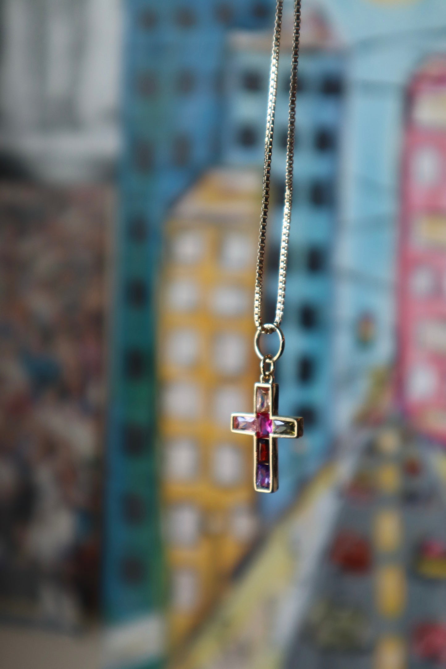 rainbow gold cross