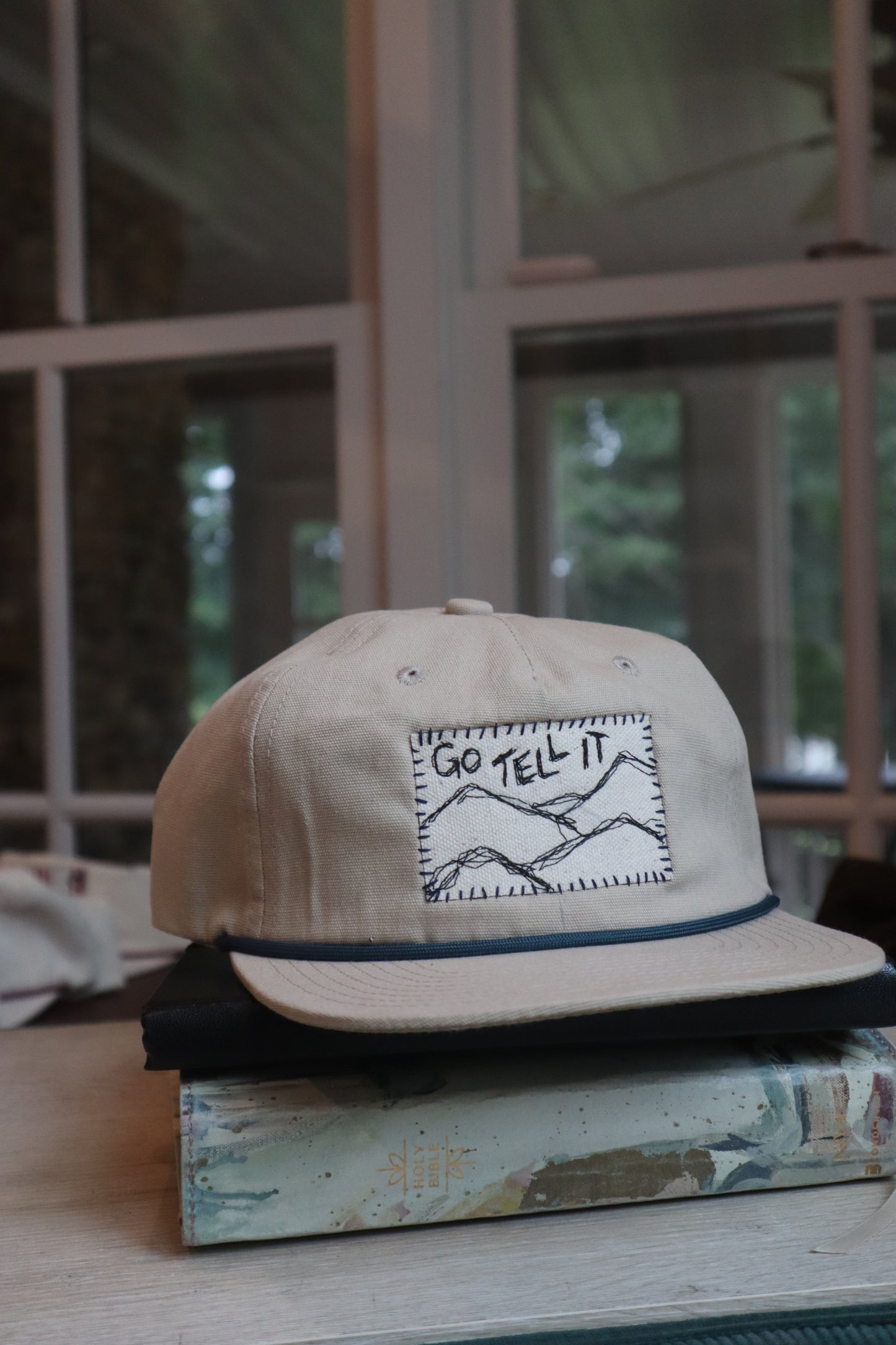 "go tell it" - beige