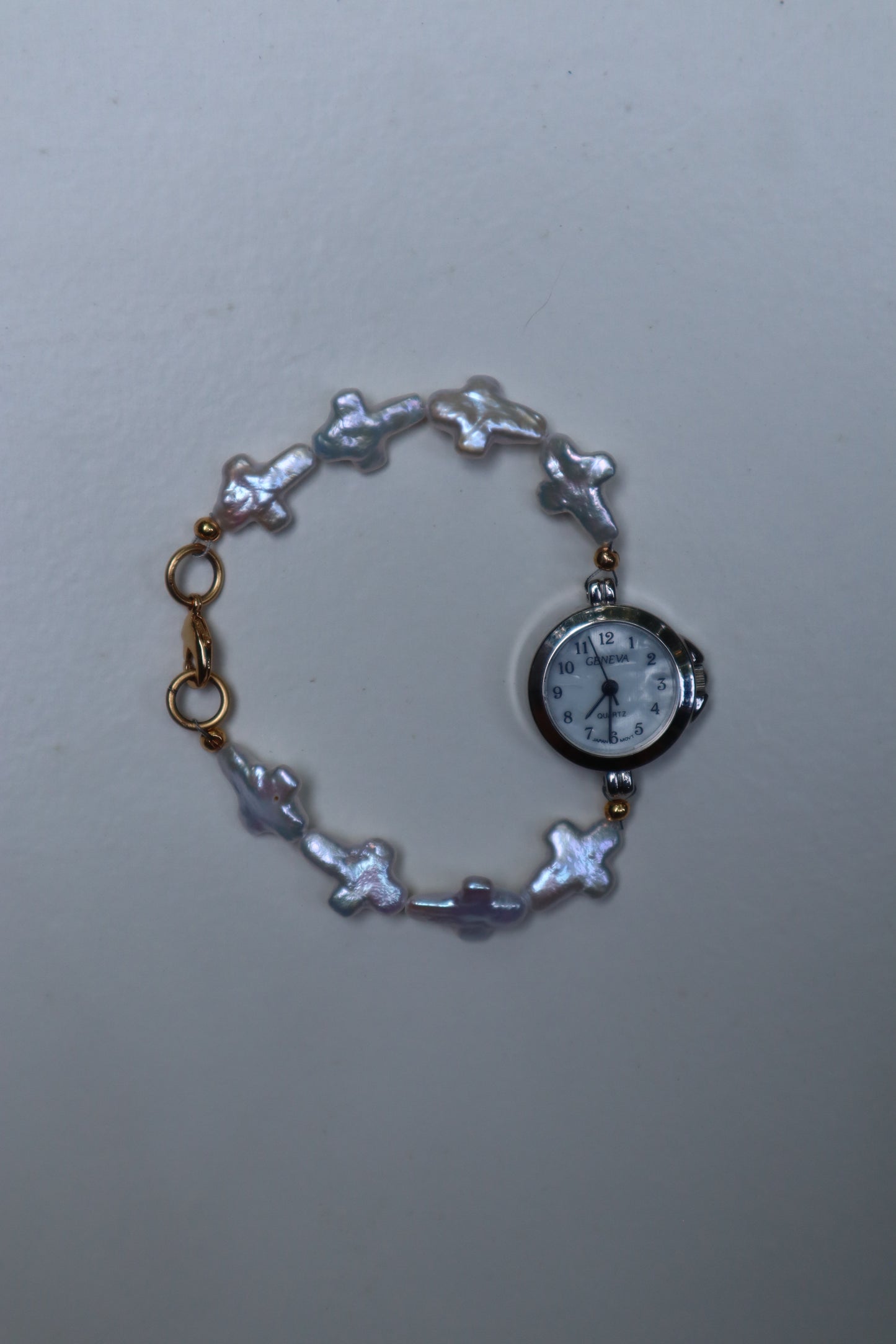 pearl cross watch