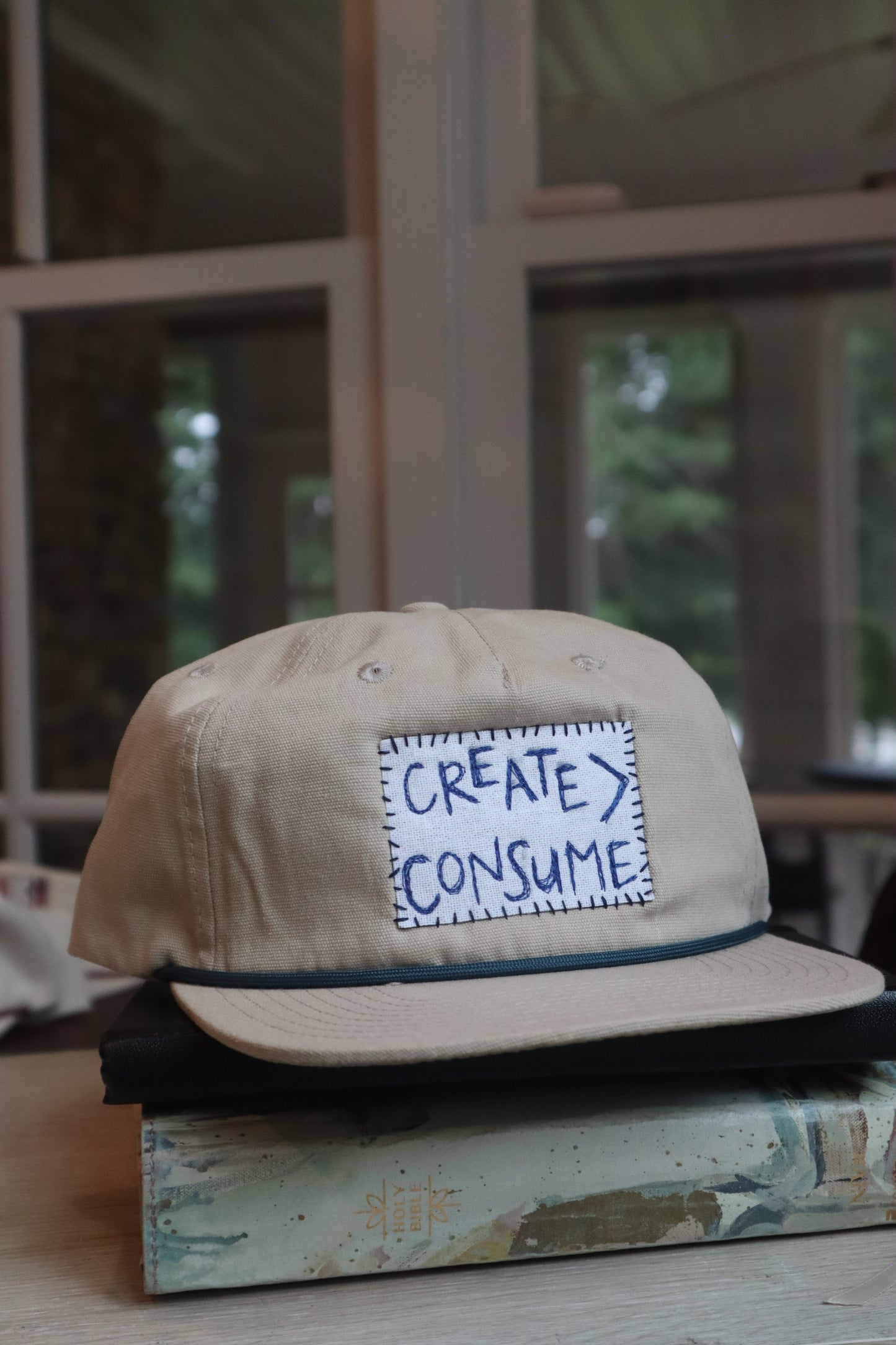 "create over consume" - beige