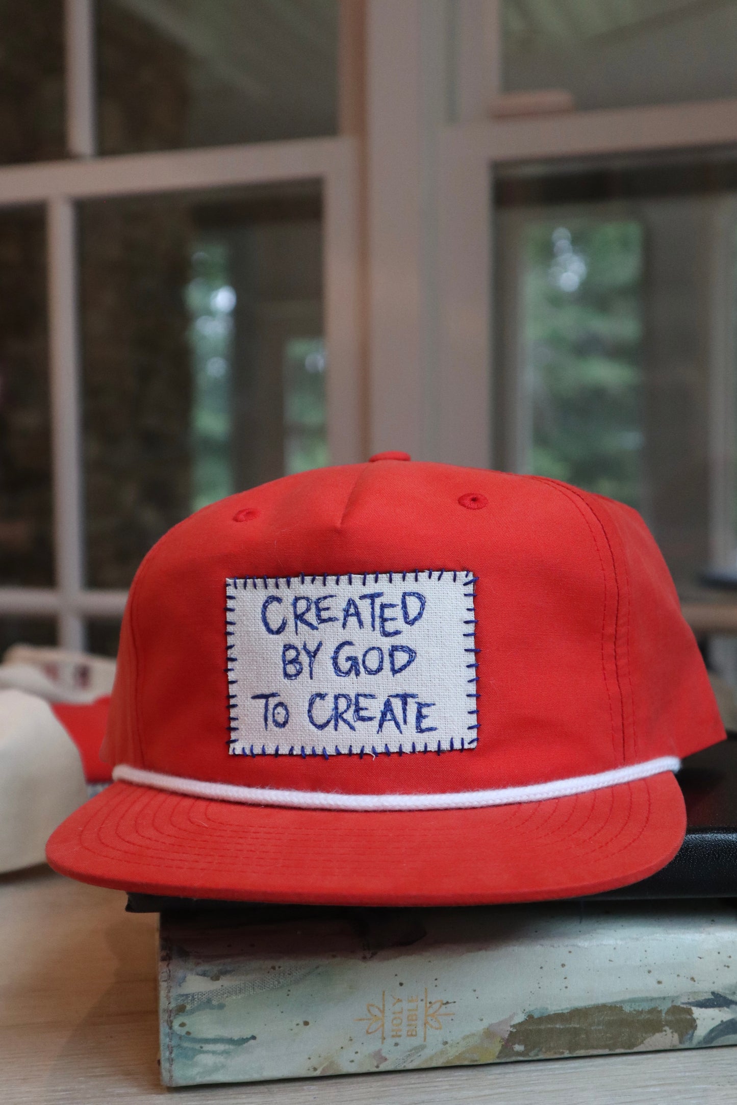 "created to create" - red