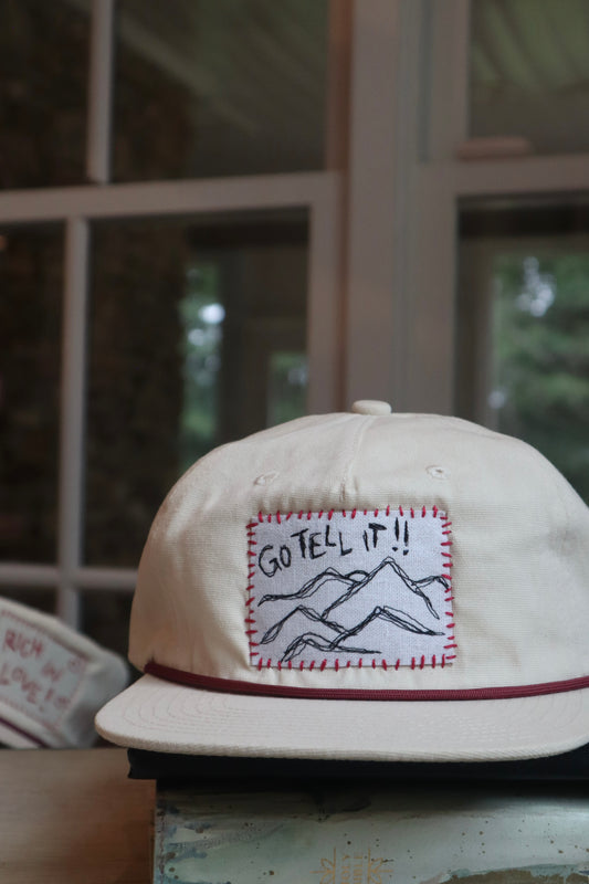 "go tell it" - white/red