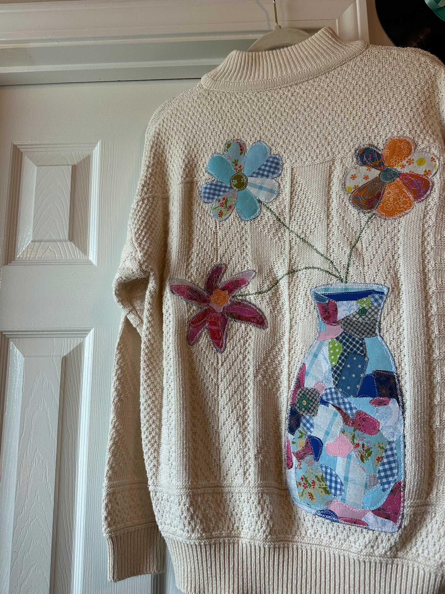 consider the flowers sweater