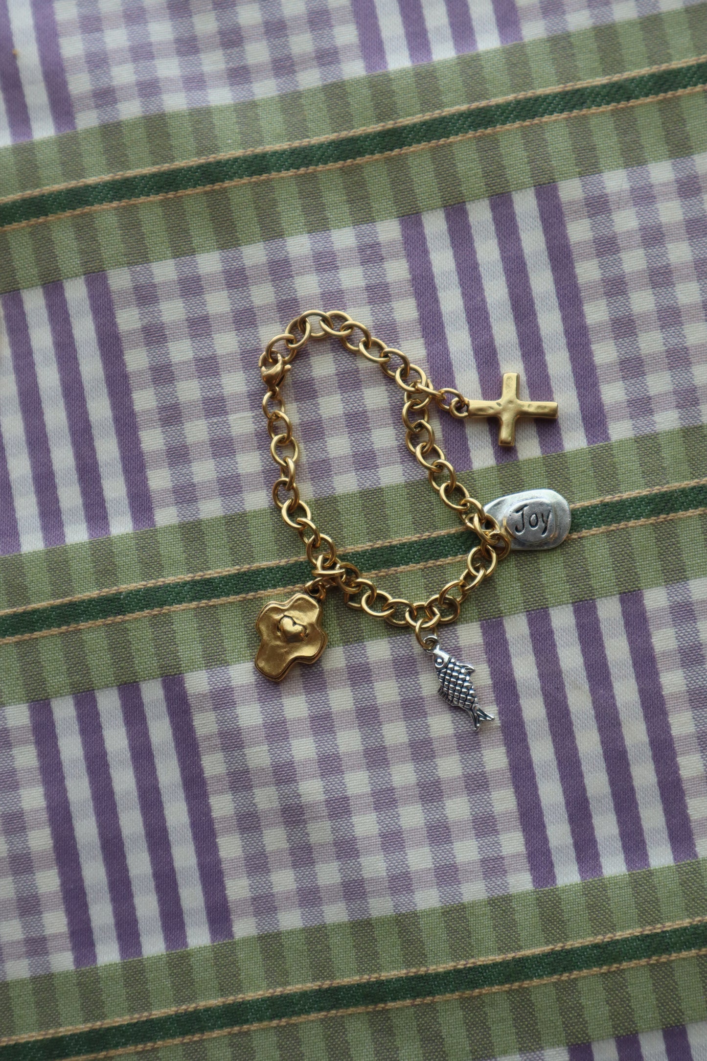 mixed metals charm bracelet