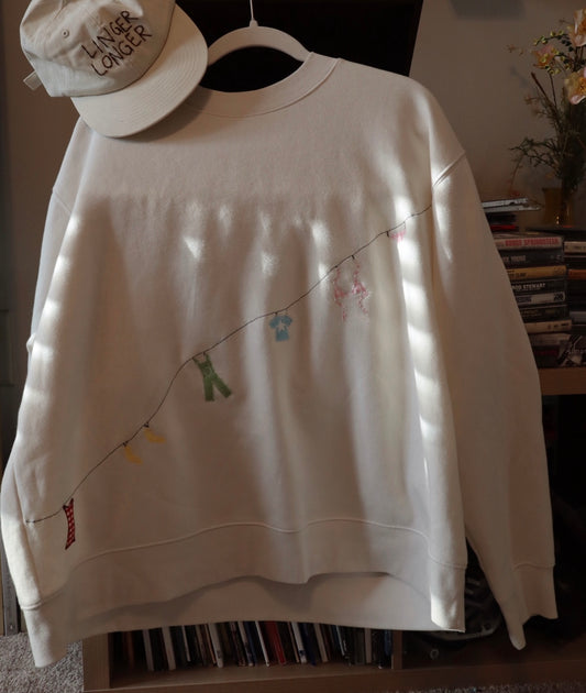 clothesline crewneck