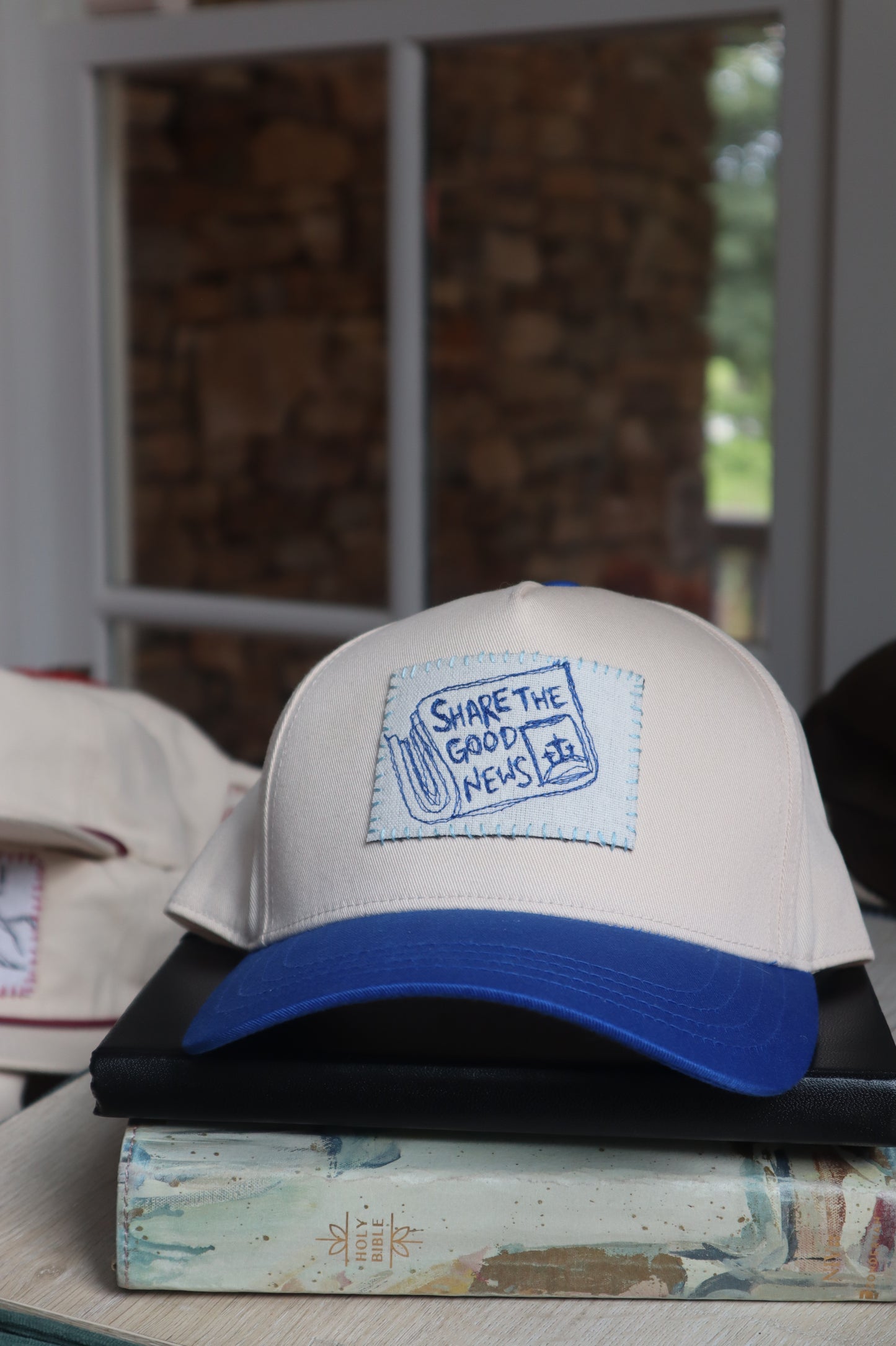 "share the good news" - blue trucker hat