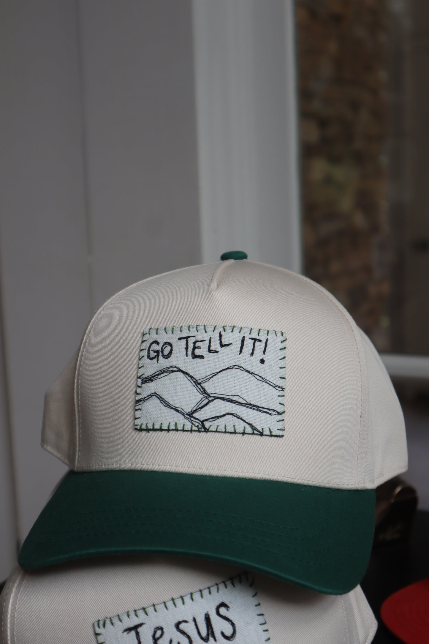 "go tell it" - green trucker hat