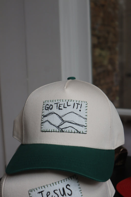 "go tell it" - green trucker hat