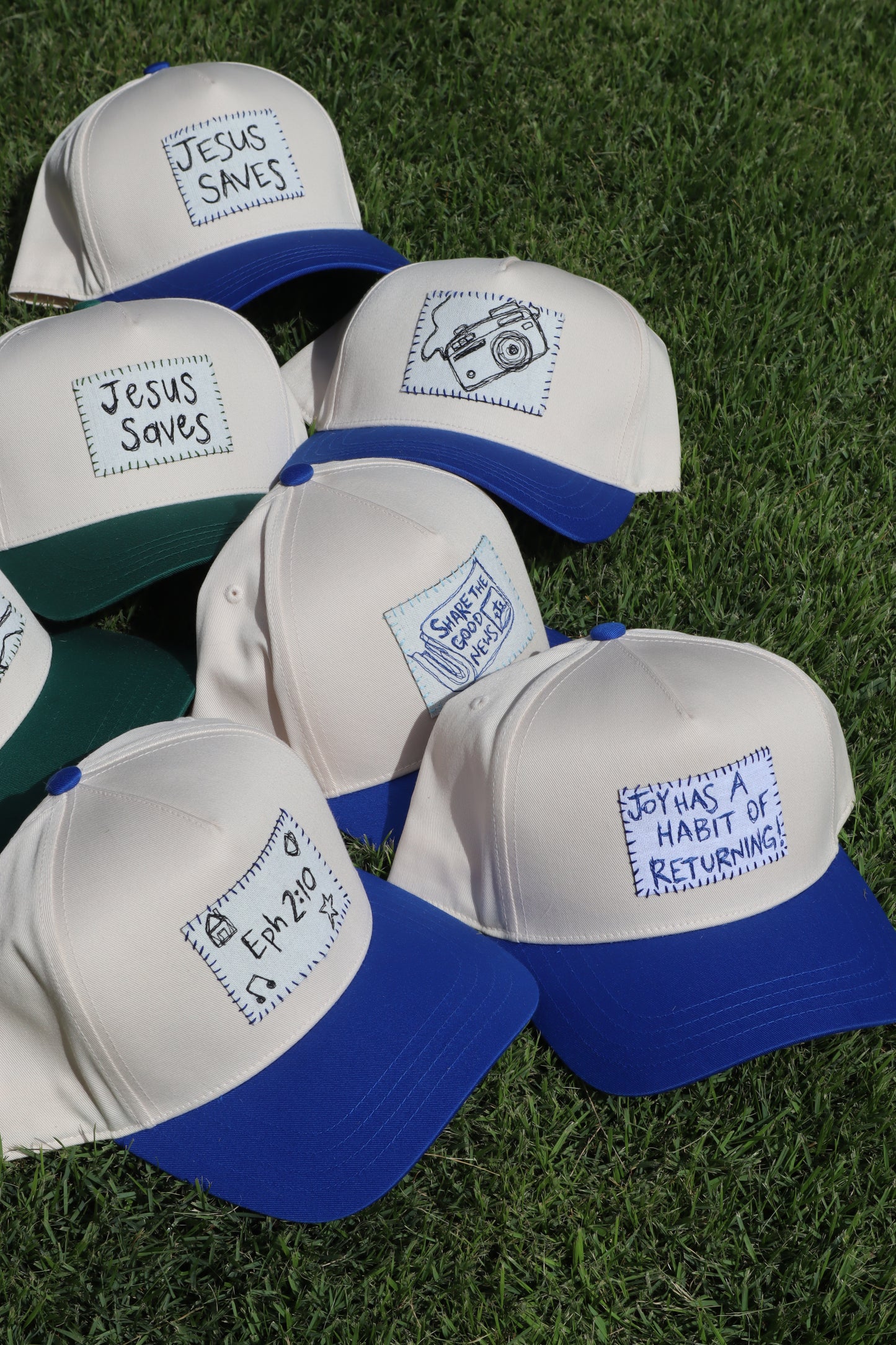 camera - blue trucker hat